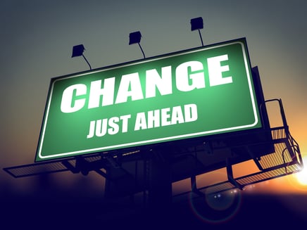 Change Just Ahead - Green Billboard on the Rising Sun Background.-1