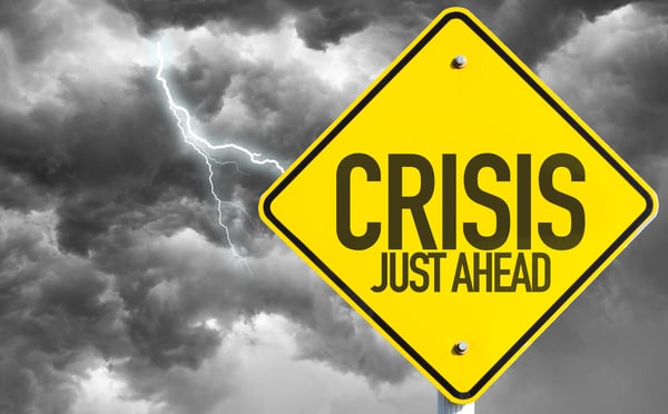 Crisis Just Ahead sign with a bad day